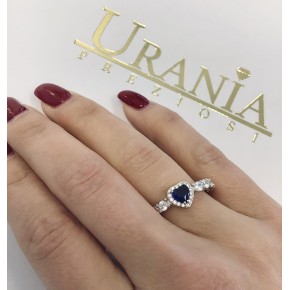 Anello Cupido chiuso con zirconi e cuore di cristallo blu